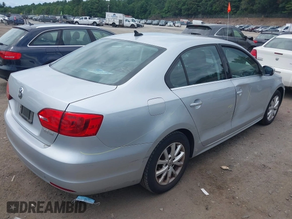 2013 Volkswagen Jetta SE with VIN 3VWDP7AJ6DM360709, listed as a IAAI auction lot 42656414 with 74,322 mi miles and . Bid and sale history available at DreamBid. Image 4.