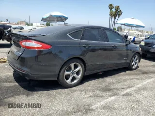 2014 Ford Fusion SE Hybrid with VIN 3FA6P0LU2ER185685, listed as a Copart auction lot 62941405 with 173,939 mi miles and Clean title. Bid and sale history available at DreamBid. Image 3.