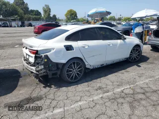 2021 BMW 2 Series 228i with VIN WBA53AK06M7H35952, listed as a Copart auction lot 63047585 with 15,701 mi miles and Salvage title. Bid and sale history available at DreamBid. Image 3.