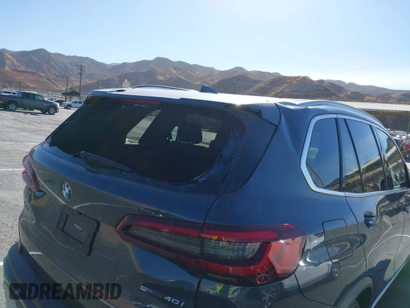 2021 BMW X5 sDrive40i with VIN 5UXCR4C00M9F94906, listed as a IAAI auction lot 41359872 with 37,161 mi miles. Bid and sale history available at carsss.com. Image 6.