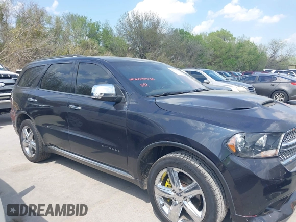 2013 Dodge Durango Citadel with VIN 1C4SDHET0DC679433, listed as a IAAI auction lot 41872173 with 223,929 mi miles and . Bid and sale history available at carsss.com. Image 13.