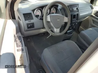 2009 Dodge Grand Caravan SE with VIN 1D8HN44E29B509835, listed as a Copart auction lot 56311925 with 105,108 mi miles and Salvage title. Bid and sale history available at DreamBid. Image 8.