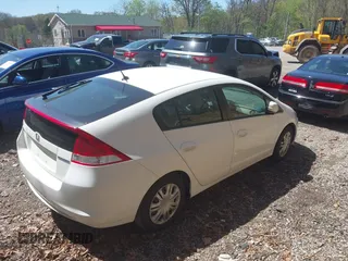 2011 Honda Insight with VIN JHMZE2H30BS012285, listed as a IAAI auction lot 42145139 with 161,672 mi miles and . Bid and sale history available at DreamBid. Image 4.