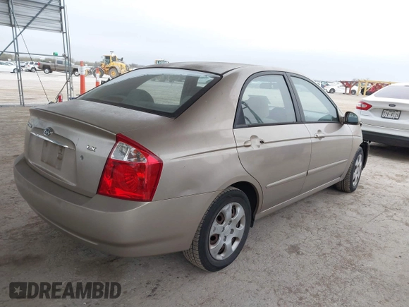 2004 Kia Spectra LX with VIN KNAFE121245064294, listed as a IAAI auction lot 41424241 with 110,136 mi miles. Bid and sale history available at carsss.com. Image 4.