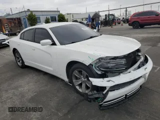 2015 Dodge Charger SXT z VIN 2C3CDXHG7FH721601, wystawiony jako Copart lot #58253925 z przebiegiem 123 004 mil mil oraz Szkoda całkowita • Salvage title. Historia ofert i sprzedaży dostępna na DreamBid. Obrazek 4.