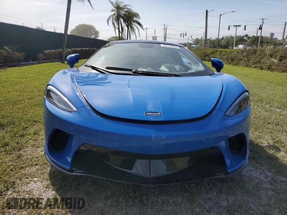 2020 McLaren GT z VIN SBM22GCA8LW000692, wystawiony jako Copart lot #44749324 z przebiegiem 18 911 mil mil oraz Nie do naprawy. Historia ofert i sprzedaży dostępna na DreamBid. Obrazek 5.