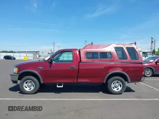 1998 Ford F-150 with VIN 1FTZF182XWKA36602, listed as a IAAI auction lot 42472442 with 112,235 mi miles and . Bid and sale history available at DreamBid. Image 14.