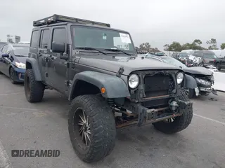 2016 Jeep Wrangler Unlimited Sport z VIN 1C4BJWDG7GL215562, wystawiony jako IAAI lot #42425994 z przebiegiem 81 895 mil mil oraz . Historia ofert i sprzedaży dostępna na DreamBid. Obrazek 1.