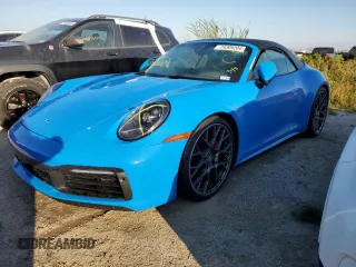 2022 Porsche 911 Carrera S z VIN WP0CB2A94NS244388, wystawiony jako Copart lot #74309204 z przebiegiem Nie podano mil oraz Szkoda całkowita • Salvage title. Historia ofert i sprzedaży dostępna na DreamBid. Obrazek 1.