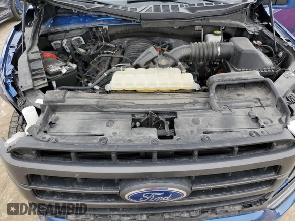 2023 Ford F-150 XL with VIN 1FTFW1E5XPKD84631, listed as a Copart auction lot 51796905 with 54,156 mi miles and Salvage Title. Bid and sale history available at carsss.com. Image 11.