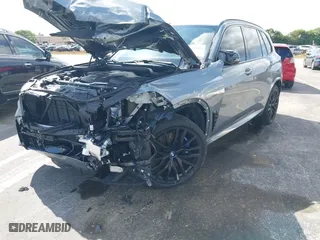 2025 BMW X5 M60i with VIN 5UX33EU03S9X62019, listed as a IAAI auction lot 41623189 with 5,749 mi miles. Bid and sale history available at carsss.com. Image 6.