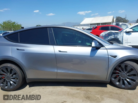 2024 Tesla Model Y Performance with VIN 7SAYGDEF9RA299036, listed as a IAAI auction lot 42140788 with 14,844 mi miles and . Bid and sale history available at DreamBid. Image 12.