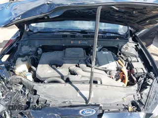 2020 Ford Fusion Hybrid SE with VIN 3FA6P0LU9LR161722, listed as a IAAI auction lot 42187436 with 49,376 mi miles. Bid and sale history available at carsss.com. Image 10.