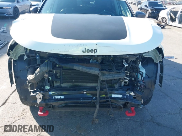 2020 Jeep Compass Trailhawk with VIN 3C4NJDDB4LT144129, listed as a IAAI auction lot 42582688 with 67,112 mi miles and . Bid and sale history available at DreamBid. Image 6.