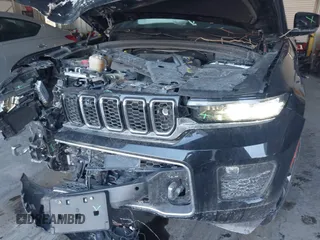 2023 Jeep Grand Cherokee Overland with VIN 1C4RJHDG5PC507978, listed as a IAAI auction lot 41394199 with 57,323 mi miles and . Bid and sale history available at DreamBid. Image 6.