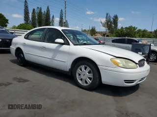 2006 Ford Taurus SEL z VIN 1FAFP56U46A209165, wystawiony jako Copart lot #56004955 z przebiegiem 52 057 mil mil oraz Czysty tytuł • Clean title. Historia ofert i sprzedaży dostępna na DreamBid. Obrazek 4.