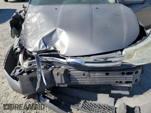 2009 Ford Focus SE z VIN 1FAHP35N59W148326, wystawiony jako Copart lot #57688025 z przebiegiem Nie podano mil oraz Szkoda całkowita • Salvage title. Historia ofert i sprzedaży dostępna na DreamBid. Obrazek 11.