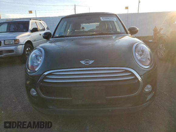2014 MINI Hardtop with VIN WMWXM5C52ET935398, listed as a Copart auction lot 83096224 with 80,661 mi miles and Salvage Title. Bid and sale history available at DreamBid. Image 5.