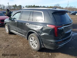 2023 Cadillac XT6 Luxury with VIN 1GYKPBR41PZ136918, listed as a IAAI auction lot 41417724 with 57,949 mi miles. Bid and sale history available at carsss.com. Image 14.