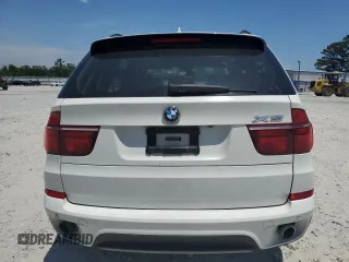 2012 BMW X5 35i z VIN 5UXZV4C54CL990840, wystawiony jako Copart lot #57715245 z przebiegiem 166 192 mil mil oraz Szkoda całkowita • Salvage title. Historia ofert i sprzedaży dostępna na DreamBid. Obrazek 6.