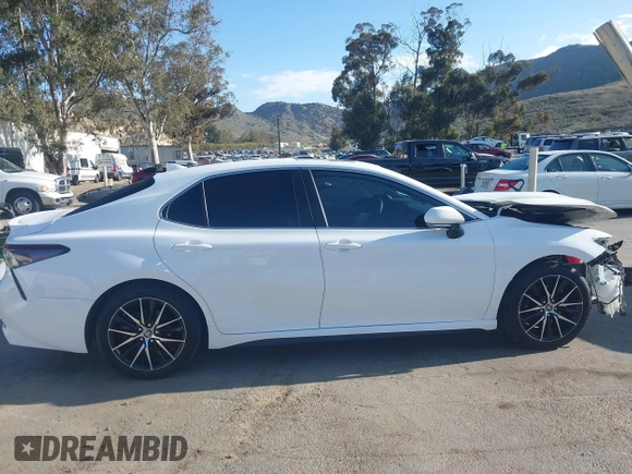 2023 Toyota Camry SE with VIN 4T1T11AK8PU836864, listed as a IAAI auction lot 41933124 with 50,263 mi miles and . Bid and sale history available at DreamBid. Image 13.