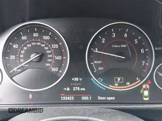 2013 BMW 3 Series 335i xDrive with VIN WBA3B9C54DF586608, listed as a IAAI auction lot 41933738 with 133,423 mi miles. Bid and sale history available at carsss.com. Image 7.