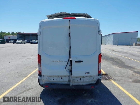2017 Ford Transit Cargo z VIN 1FTYE1CM2HKB56212, wystawiony jako IAAI lot #42102063 z przebiegiem 174 769 mil mil oraz . Historia ofert i sprzedaży dostępna na DreamBid. Obrazek 16.