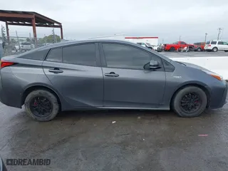 2019 Toyota Prius L Eco with VIN JTDKARFU3K3099256, listed as a IAAI auction lot 41813619 with 169,900 mi miles. Bid and sale history available at carsss.com. Image 13.