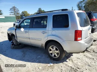 2010 Honda Pilot Touring with VIN 5FNYF3H84AB002687, listed as a Copart auction lot 80246724 with 210,934 mi miles and Salvage Title. Bid and sale history available at DreamBid. Image 2.