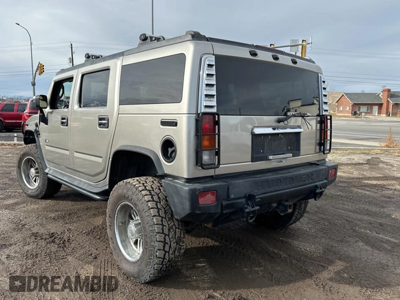 2003 Hummer H2 with VIN 5GRGN23UX3H124517, listed as a Copart auction lot 41650395 with 999,999 mi miles and Clean Title. Bid and sale history available at carsss.com. Image 3.