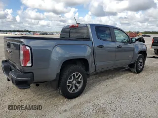 2021 GMC Canyon 4WD AT4 w/Cloth with VIN 1GTG6FEN9M1186142, listed as a Copart auction lot 80284954 with 29,663 mi miles and Non Repairable. Bid and sale history available at carsss.com. Image 3.