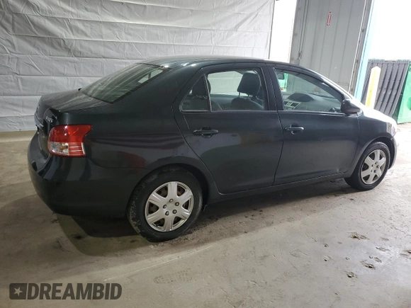 2009 Toyota Yaris z VIN JTDBT903991335683, wystawiony jako Copart lot #52565155 z przebiegiem 143 737 mil mil oraz Szkody całkowita. Historia ofert i sprzedaży dostępna na DreamBid. Obrazek 3.