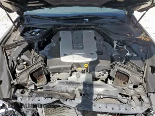 2015 Infiniti Q50 z VIN JN1BV7AR4FM423894, wystawiony jako Copart lot #57297595 z przebiegiem 82 593 mil mil oraz Szkoda całkowita • Salvage title. Historia ofert i sprzedaży dostępna na DreamBid. Obrazek 11.
