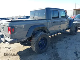 2020 Jeep Gladiator Sport S with VIN 1C6JJTAG6LL190749, listed as a IAAI auction lot 41401209 with 97,292 mi miles and . Bid and sale history available at DreamBid. Image 4.