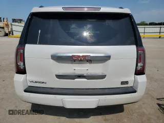 2016 GMC Yukon SLT with VIN 1GKS2BKC2GR253823, listed as a Copart auction lot 62029824 with 98,825 mi miles and Salvage Title. Bid and sale history available at carsss.com. Image 6.