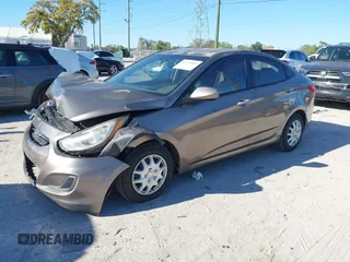2014 Hyundai Accent GLS with VIN KMHCT4AE6EU639694, listed as a IAAI auction lot 41674605 with 101,549 mi miles and . Bid and sale history available at carsss.com. Image 2.