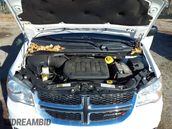 2019 Dodge Grand Caravan SE with VIN 2C4RDGBG2KR799660, listed as a IAAI auction lot 41898556 with 104,642 mi miles and . Bid and sale history available at DreamBid. Image 10.