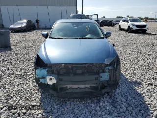 2017 Mazda 3 Touring z VIN JM1BN1L7XH1102372, wystawiony jako Copart lot #61180195 z przebiegiem 57 606 mil mil oraz Szkoda całkowita • Salvage title. Historia ofert i sprzedaży dostępna na DreamBid. Obrazek 5.