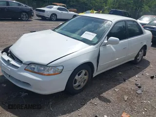 1999 Honda Accord LX z VIN JHMCG5643XC000176, wystawiony jako IAAI lot #42193734 z przebiegiem 261 485 mil mil oraz . Historia ofert i sprzedaży dostępna na DreamBid. Obrazek 2.