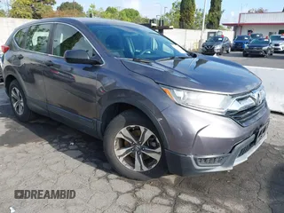 2018 Honda CR-V LX with VIN 2HKRW5H36JH426040, listed as a IAAI auction lot 42031936 with 94,564 mi miles. Bid and sale history available at carsss.com. Image 1.