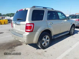 2010 Ford Escape Limited with VIN 1FMCU0E79AKA34964, listed as a IAAI auction lot 42615416 with 197,068 mi miles and . Bid and sale history available at DreamBid. Image 4.