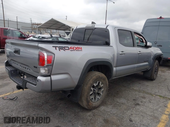 2021 Toyota Tacoma SR z VIN 3TMCZ5AN3MM374132, wystawiony jako IAAI lot #42068562 z przebiegiem 38 654 mil mil oraz . Historia ofert i sprzedaży dostępna na DreamBid. Obrazek 4.