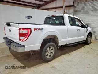 2023 Ford F-150 XL с VIN 1FTFX1E57PKE30607, выставлен на аукционе Copart как лот 63669345 с пробегом 91 148 миль миль и Чистый • Clean title. История ставок и продаж доступна на DreamBid. Изображение 3.