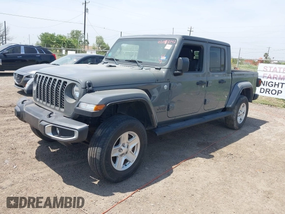 2021 Jeep Gladiator Sport S z VIN 1C6JJTAG9ML538769, wystawiony jako IAAI lot #42078142 z przebiegiem 49 924 mil mil oraz . Historia ofert i sprzedaży dostępna na DreamBid. Obrazek 2.
