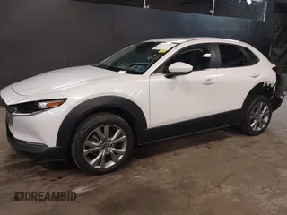 2021 Mazda CX-30 Preferred z VIN 3MVDMBCL2MM210902, wystawiony jako IAAI lot #42522203 z przebiegiem 42 995 mil mil oraz . Historia ofert i sprzedaży dostępna na DreamBid. Obrazek 2.