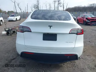 2022 Tesla Model Y Long Range z VIN 7SAYGDEE0NF435252, wystawiony jako IAAI lot #41449612 z przebiegiem 48 671 mil mil oraz . Historia ofert i sprzedaży dostępna na DreamBid. Obrazek 16.