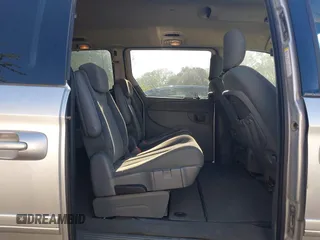 2005 Dodge Caravan SXT with VIN 2D4GP44LX5R540512, listed as a IAAI auction lot 42140912 with 259,855 mi miles and . Bid and sale history available at carsss.com. Image 8.