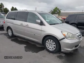 2005 Honda Odyssey LX with VIN 5FNRL38205B026824, listed as a IAAI auction lot 42068656 with 140,914 mi miles. Bid and sale history available at carsss.com. Image 1.