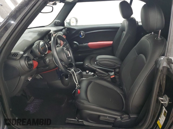 2017 MINI Convertible Cooper with VIN WMWWG5C36H3C99710, listed as a Copart auction lot 89058985 with 49,934 mi miles and Salvage title. Bid and sale history available at DreamBid. Image 7.