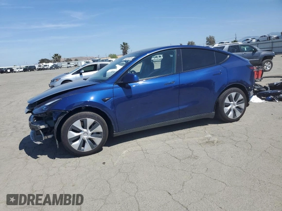 2024 Tesla Model Y Long Range z VIN 7SAYGAEE3RF034699, wystawiony jako Copart lot #54523815 z przebiegiem 9 764 mil mil oraz Szkoda całkowita • Salvage title. Historia ofert i sprzedaży dostępna na DreamBid. Obrazek 1.